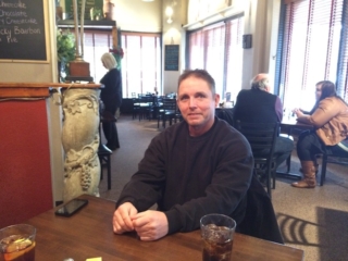 man having ice tea