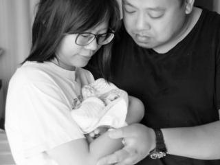 Couple with tiny baby